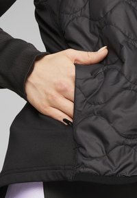 Puma CLOUDSPUN WRMLBL  - Liemenė - black