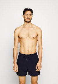 Tommy Hilfiger MEDIUM DRAWSTRING - Swimming shorts - desert sky
