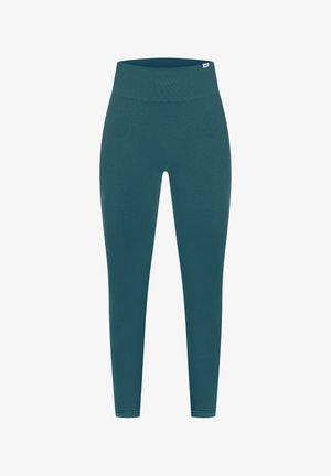 Türkise Leggings mit hohem, geripptem Bund, glatter Textur und figurnahem Design. Keine sichtbaren Muster oder Hardwaredetails.