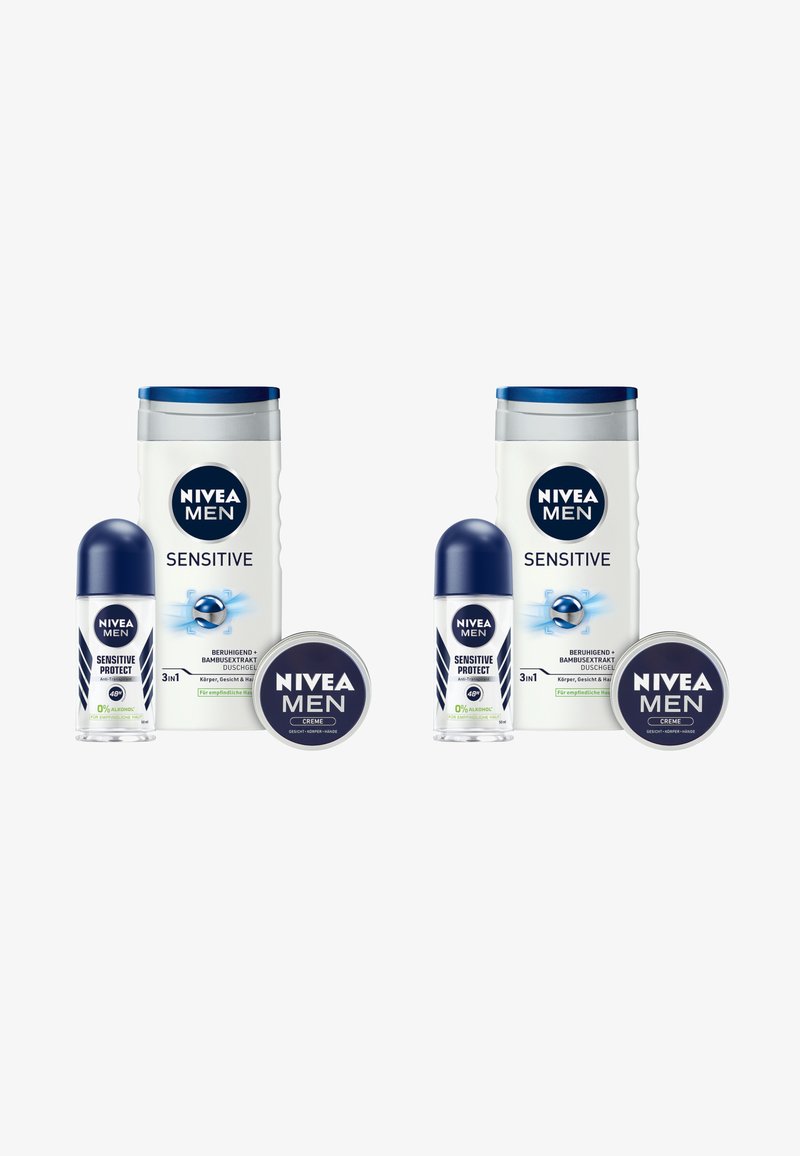 Die NIVEA Men Sensitive Produktlinie umfasst ein blau-weißes 3-in-1 Duschgel, Deos und eine Creme in runden Behältern mit silbernen Akzenten.