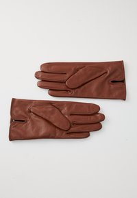 Brown leather gloves with a smooth texture, featuring five fingers, a thumb, and a distinct seam near the wrist. No visible hardware.