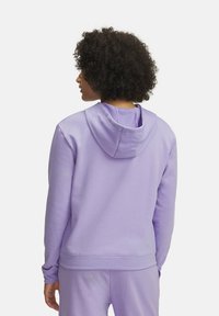 Purple pullover hoodie with a textured fabric, kangaroo pocket, and adjustable drawstring hood. Ribbed cuffs and hem complete the design.
