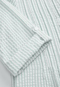 Ikke valgt, turquoise striped