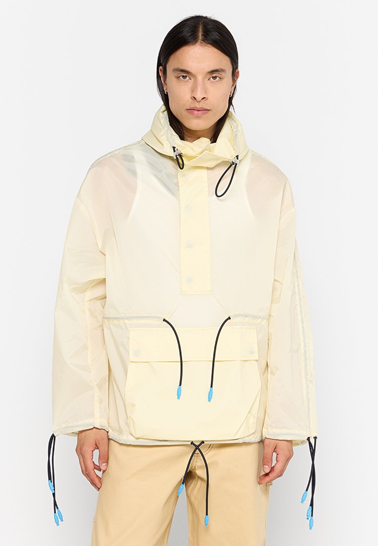 Sunnei Lichte jas geel