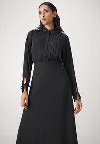 Bruuns Bazaar CAMILLABBARAS SKIRT - Gonna a campana - black
