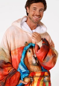 Fleece oversized hoodie featuring a colorful print of a guineapig in a hood, with a soft, fluffy inner lining and vibrant red and orange hues.
