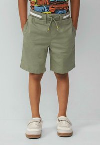 Khaki shorts van zachte stof, met een elastische tailleband en een trekkoord, en twee zijzakken. Met gezoomde boorden en een ontspannen pasvorm.