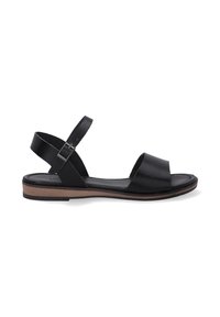 Sort lædersandal med åben tå-design, justerbar ankelrem og en brun flad sål. Har minimalistisk stil og glat tekstur.