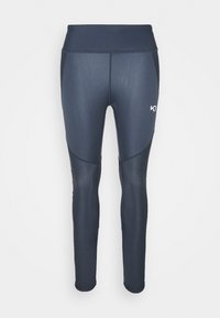 Leggings sportivi blu navy con vita alta, texture liscia e pannelli a contrasto sui lati. Presentano un piccolo logo sul davanti.
