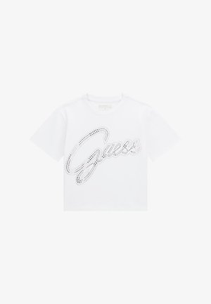Biała koszulka z krótkim rękawem z bawełny, z błyszczącym, kropkowanym logo "Guess" w kolorze srebrnym na przodzie, z klasycznym dekoltem okrągłym.