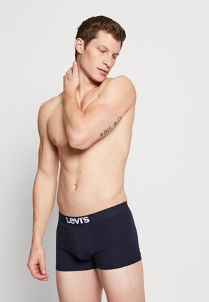 Marineblaue Boxershorts mit einem weichen Bund, der das Levi's-Logo trägt. Glatter Stoff mit passgenauem Schnitt und ohne sichtbare Muster.