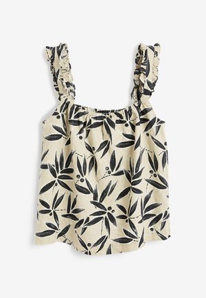 Top beige sans manches avec motif noir de feuilles et baies, bretelles et encolure à volants, posé à plat sur fond blanc.