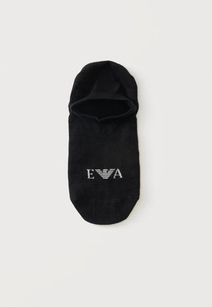 Chaussette noire basse avec texte blanc "E V A" et logo ailé au centre, affichée sur un fond clair uni.