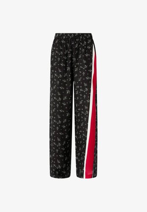 Pantalones negros con estampado floral, con cinturilla elástica y diseño de pierna ancha, que presentan un detalle de franjas roja y blanca en el lateral.
