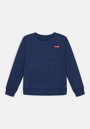 Sweat-shirt bleu marine à manches longues, col et poignets côtelés. Présente un petit logo rouge Levi's sur le devant. Tissu doux et texturé.