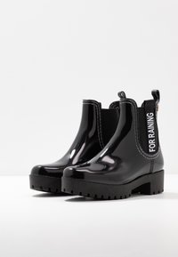 Gioseppo Botas de agua - black