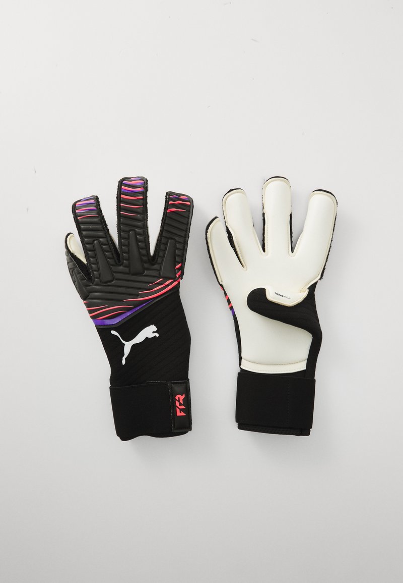 Black and white goalkeeper gloves with a textured grip and colorful grooves. Features a black cuff with a logo and pink accents.