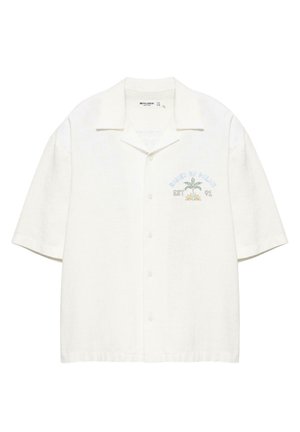 Chemise blanche à manches courtes avec boutons et col, avec un petit motif de palmier et le texte « EST 91 » sur la poitrine gauche.