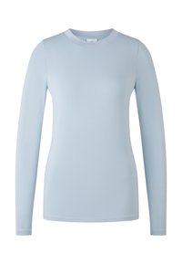 Chemise à manches longues bleu clair en tissu doux, avec un col rond et une coupe ajustée, bénéficiant de coutures lisses et sans motifs visibles.