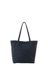 Marineblaue Tragetasche aus geripptem Material, mit zwei langen Griffen und rechteckiger Form. Minimalistisches Design mit einem dezenten Logo-Akzent.