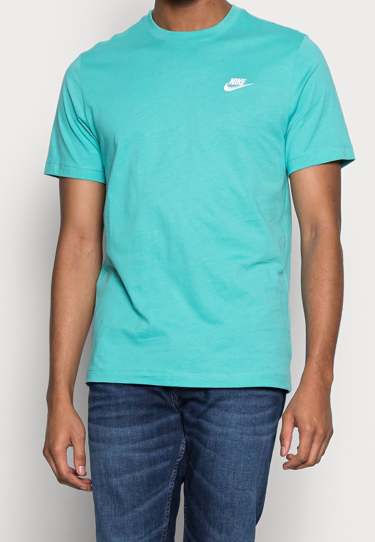 turquoise nike shirt