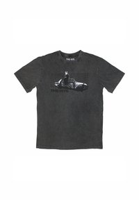 Black cotton t-shirt featuring a graphic print of a figure seated on a car, with "THE1975" text underneath. Short sleeves, crew neck design.