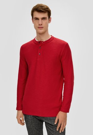 - Bluzka z długim rękawem