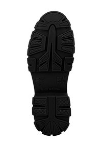 Semelle extérieure en caoutchouc noir avec surface texturée et motif de semelle multidirectionnel. Les marquages incluent la taille UK 6, EUR 39, USA 8, et "Fabriqué en Chine."