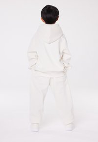 Champion EXCLUSIVE HOODIE UNISEX - Felpa con cappuccio - off-white