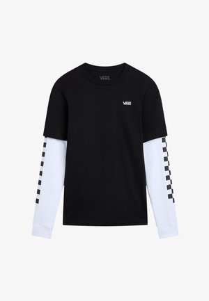 Svart kortärmad skjorta med vita långärmar. Har en liten Vans-logotyp och svart rutmönster längs de vita ärmarna.