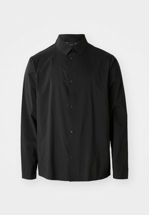 Black long-sleeve shirt made of lightweight fabric. Features a button-up front, pointed collar, and subtle brand logo on the chest.
