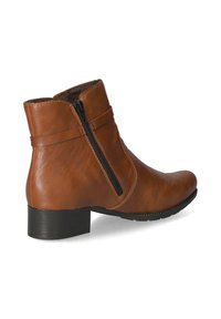 Bottine en cuir marron avec une fermeture éclair latérale noire, un talon bloc bas et une texture lisse sur fond blanc.