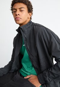 Ellesse VIARONNA - Summer jacket - black
