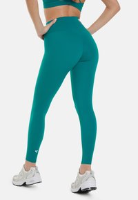 SQUATPROOF Tajice-hlače - teal green