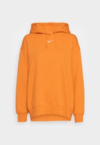 Orange hoodie made of soft fabric, featuring a front pocket, drawstring hood, and a white Nike logo centered on the chest.