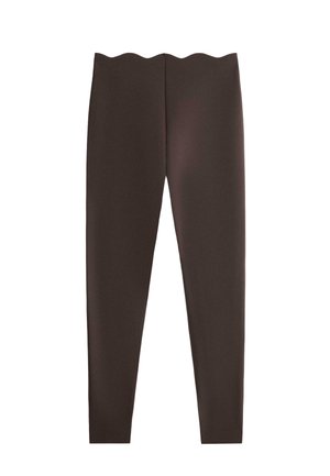 Dark brown full-length leggings with a scalloped edge waistband, shown flat on a white background.