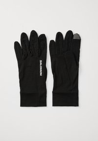 Gants noirs en tissu texturé, avec une segmentation des doigts et un bout de doigt sensible au toucher. Logo "SALOMON" en blanc sur le côté.