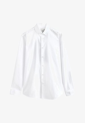 Hvid langærmet skjorte med knapper, knaplukket krave, synlig mærkat indeni nakken og plisserede manchetter på ærmerne.
