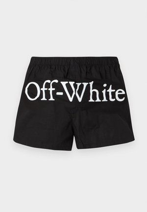 Black elastic-waist shorts with large white "Off-White" text across the back.