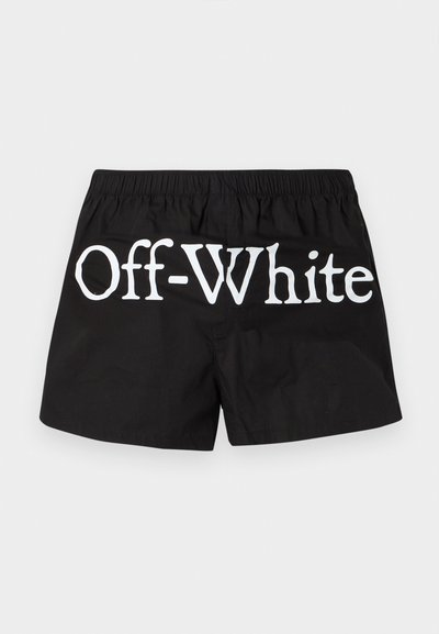 Short noir à taille élastique avec un grand texte blanc « Off-White » au dos.