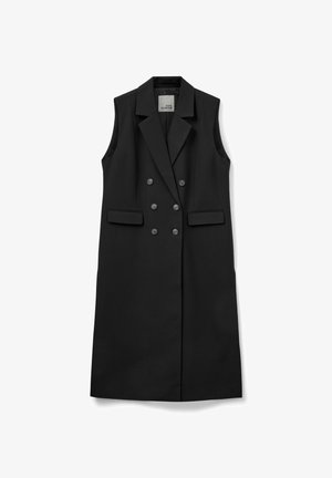 Black sleeveless vest with a double-breasted design, notched lapel, two front pockets, and six buttons for closure. Smooth fabric texture.