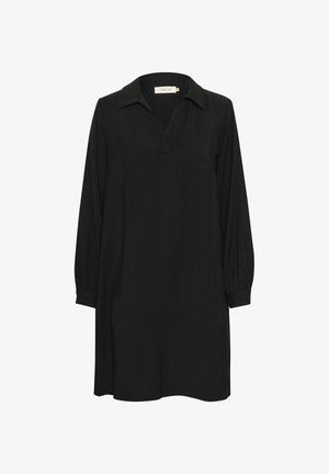 Zwarte tuniekjurk met een kraag, lange poffende mouwen, een V-halslijn en zijsplitten. Gemaakt van zachte, lichte stof.