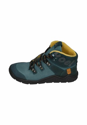Green hiking boot with a textured leather exterior, yellow fleece lining, black rubber sole, and yellow-black laces. Features a logo on the collar.