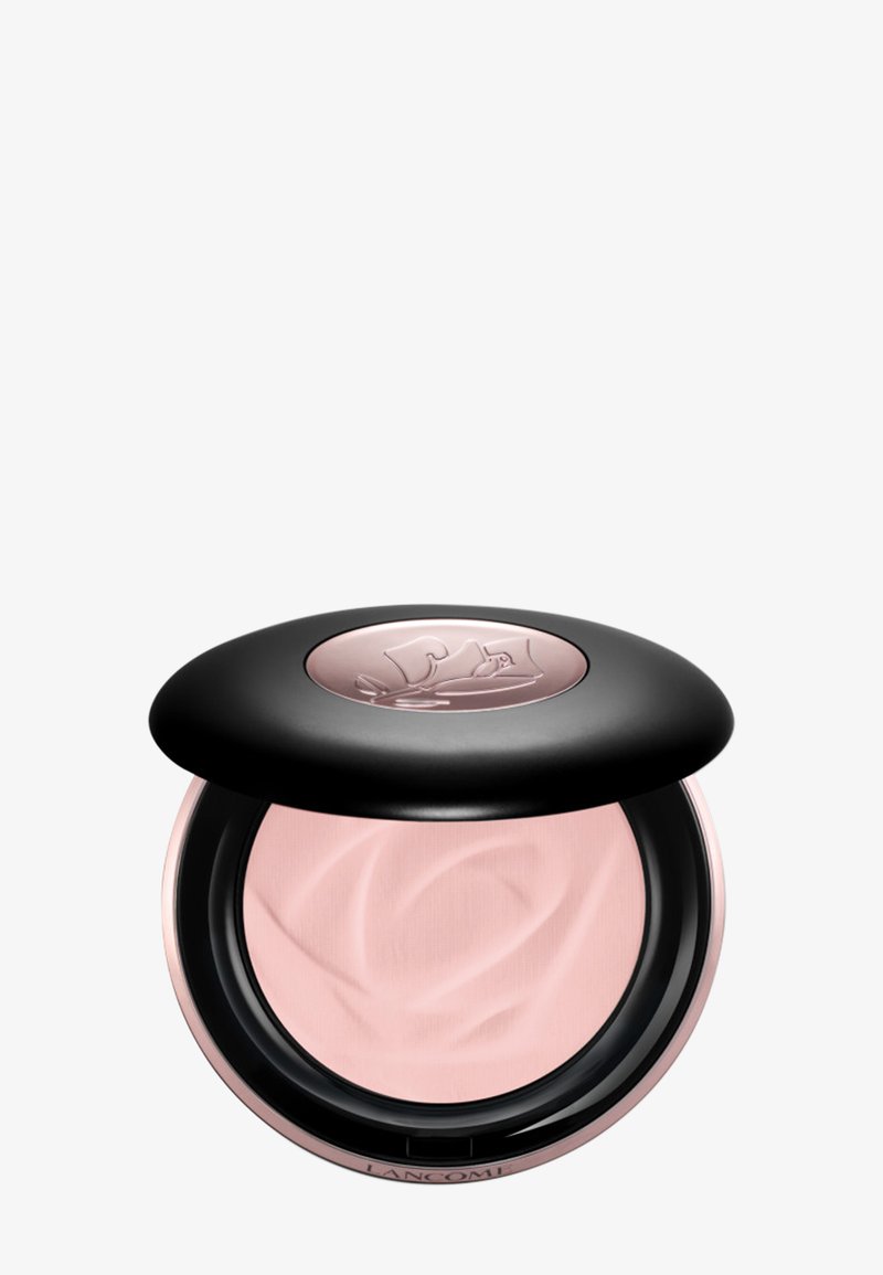 Round compact with light pink powder and black lid featuring embossed rose logo, Lancôme branding on the side.