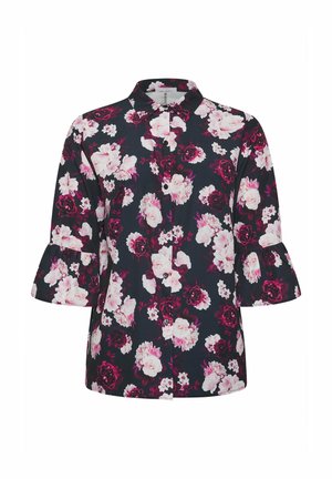Blusa floreale in blu navy scuro con rose rosa e bordeaux, chiusura frontale con bottoni e maniche a tre quarti svasate. Tessuto morbido, design casual.