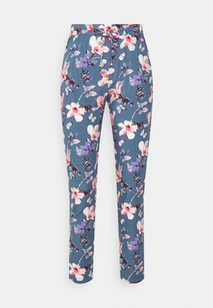 Floral trousers in a blue fabric featuring pink and purple flowers and butterflies, with an elastic waistband and drawstring closure.