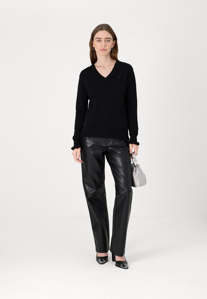 DKNY V-Neck Faux Leather Front Knit Top Maglia di Tuta Donna