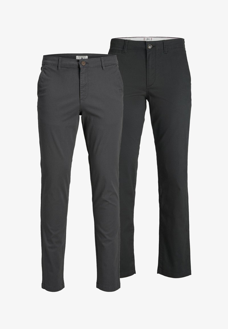 Deux paires de pantalons slim pour hommes, un gris foncé et un noir, vue de face avec bouton et passants de ceinture visibles.