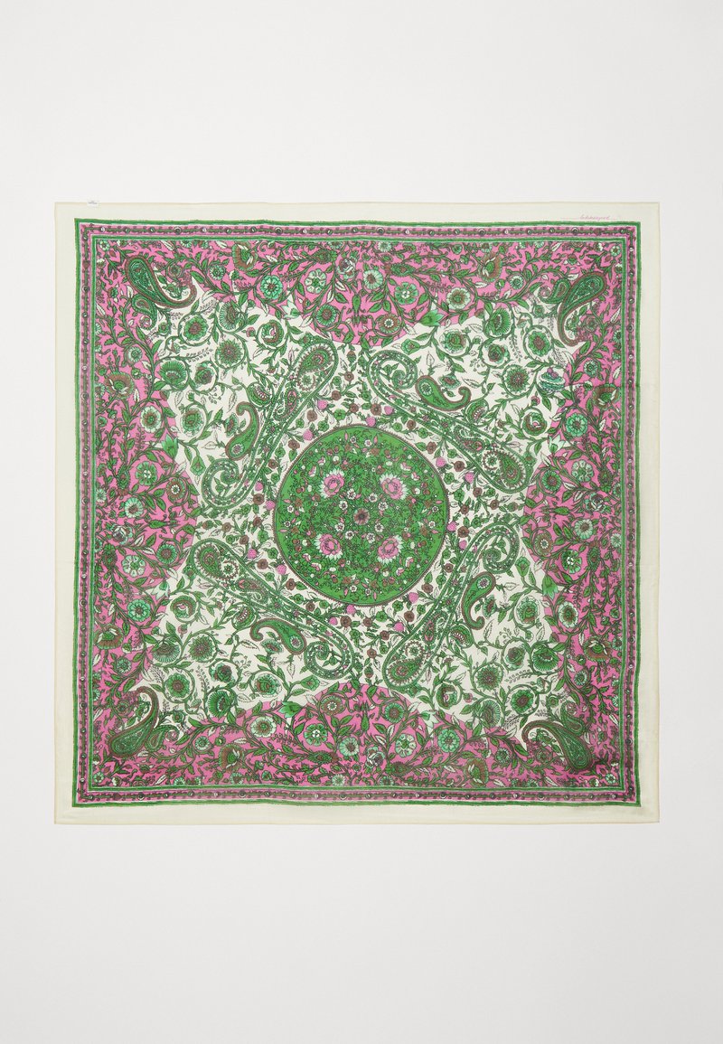 Square silk scarf featuring a floral pattern in green and pink with a central circular design. Edges have a decorative border.