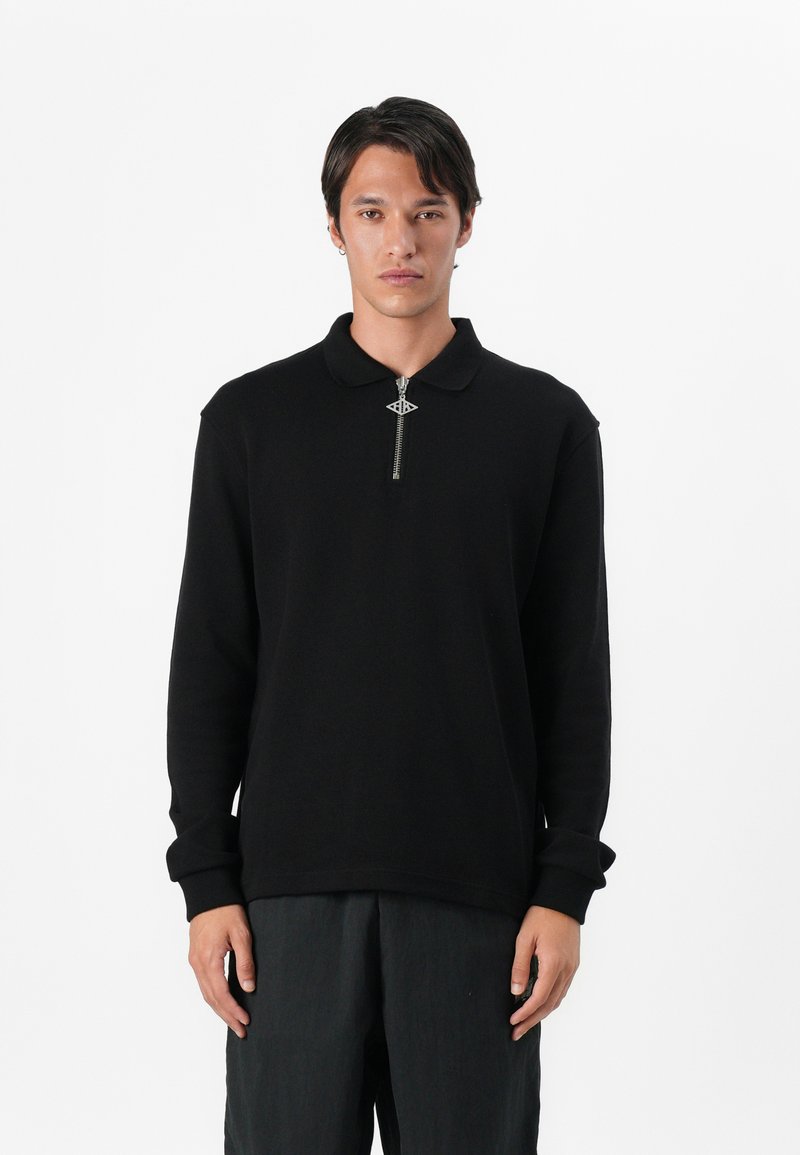 Han Kjøbenhavn Poloshirt zwart Han Kjøbenhavn Poloshirt zwart